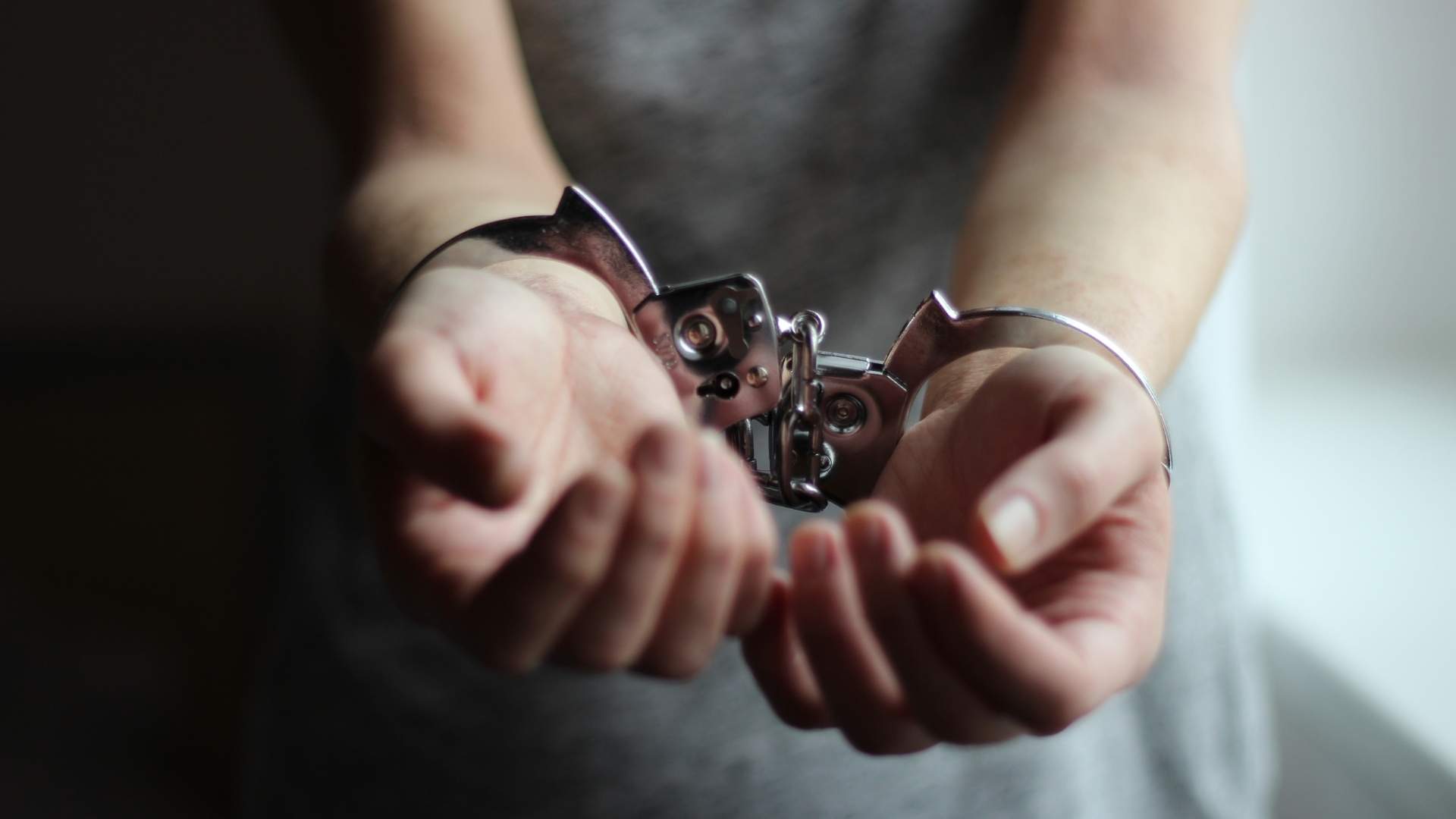 hands in handcuffs