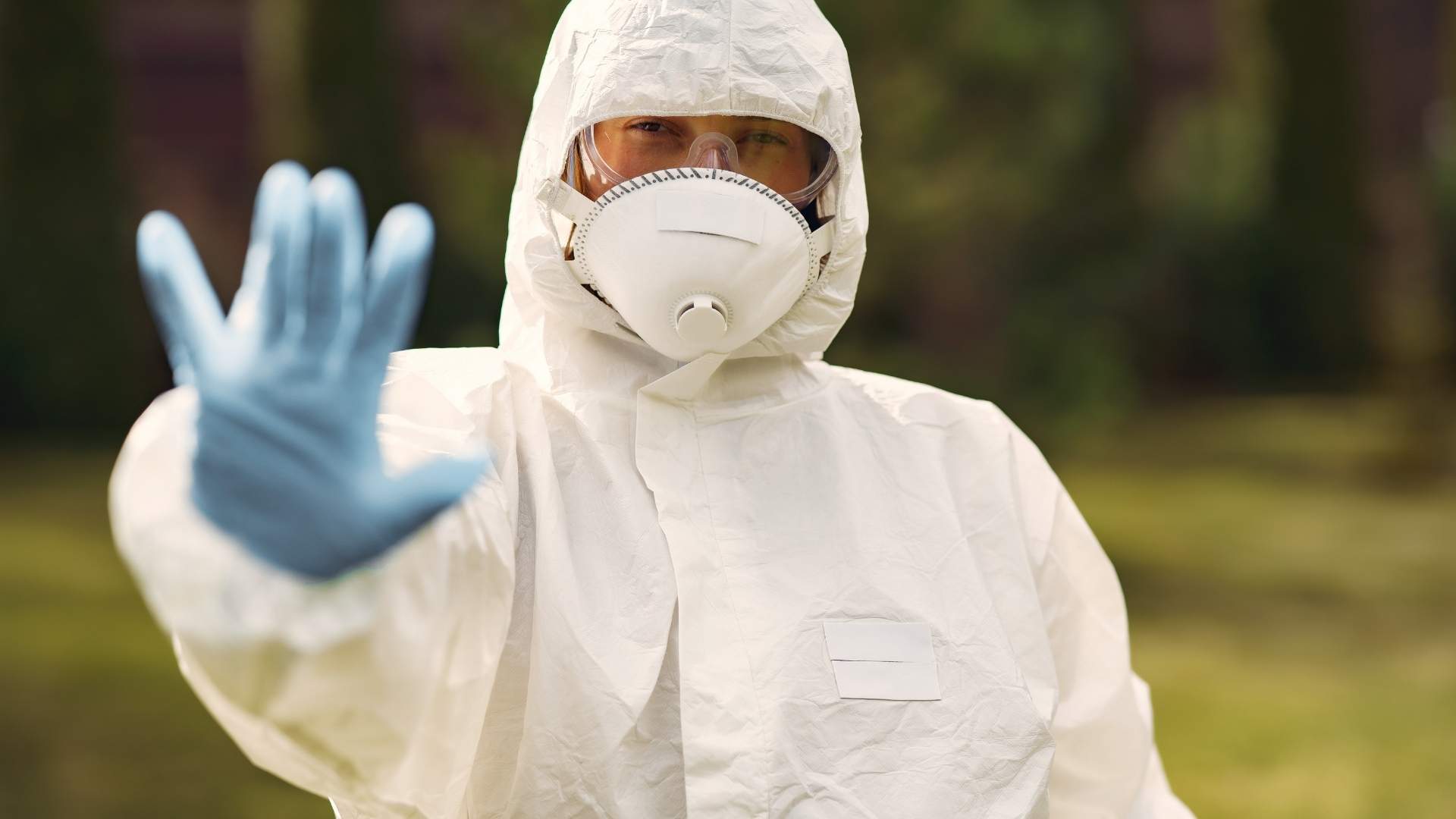 man in hazmat suit