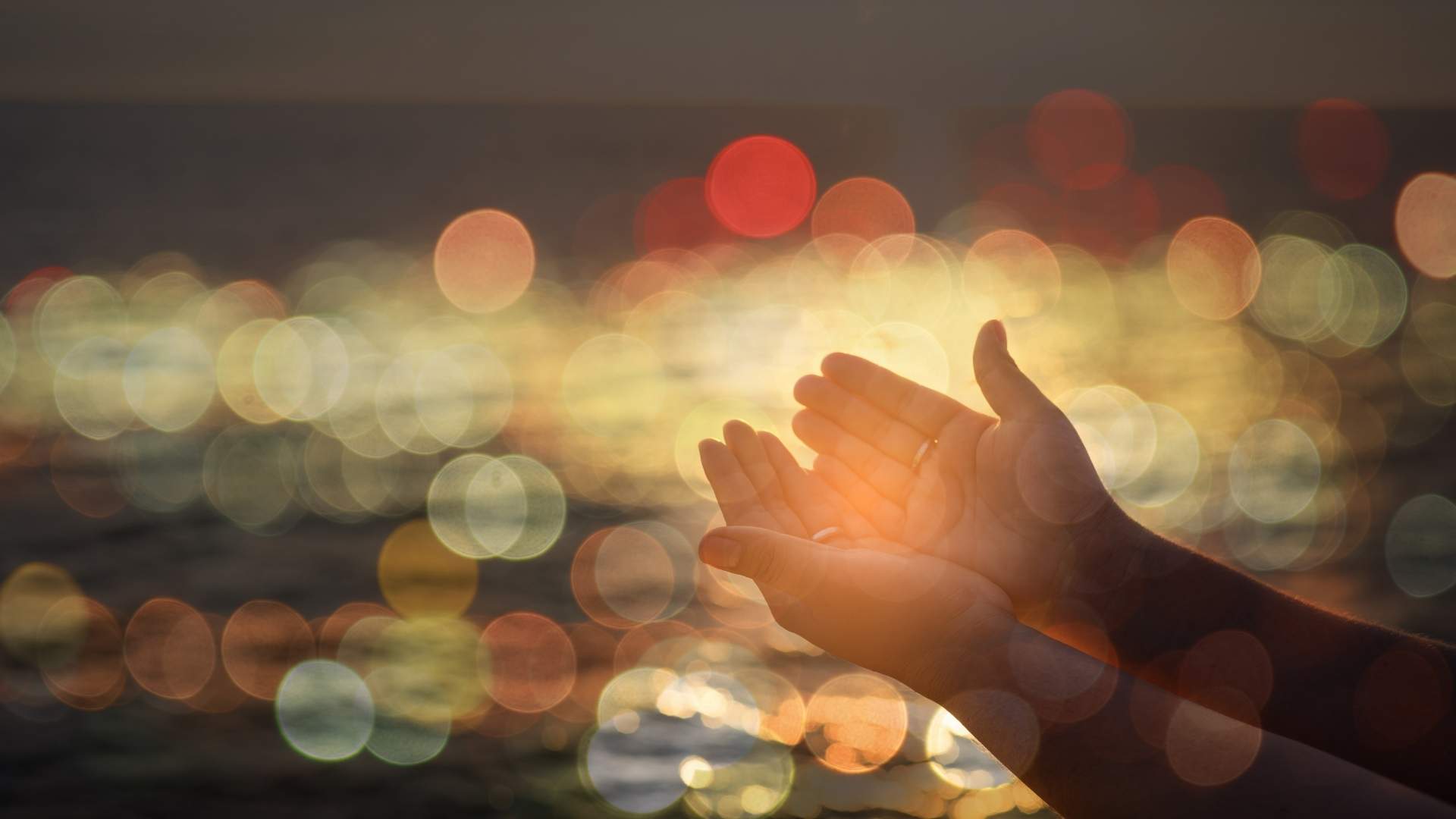 prayer_hands_bokeh