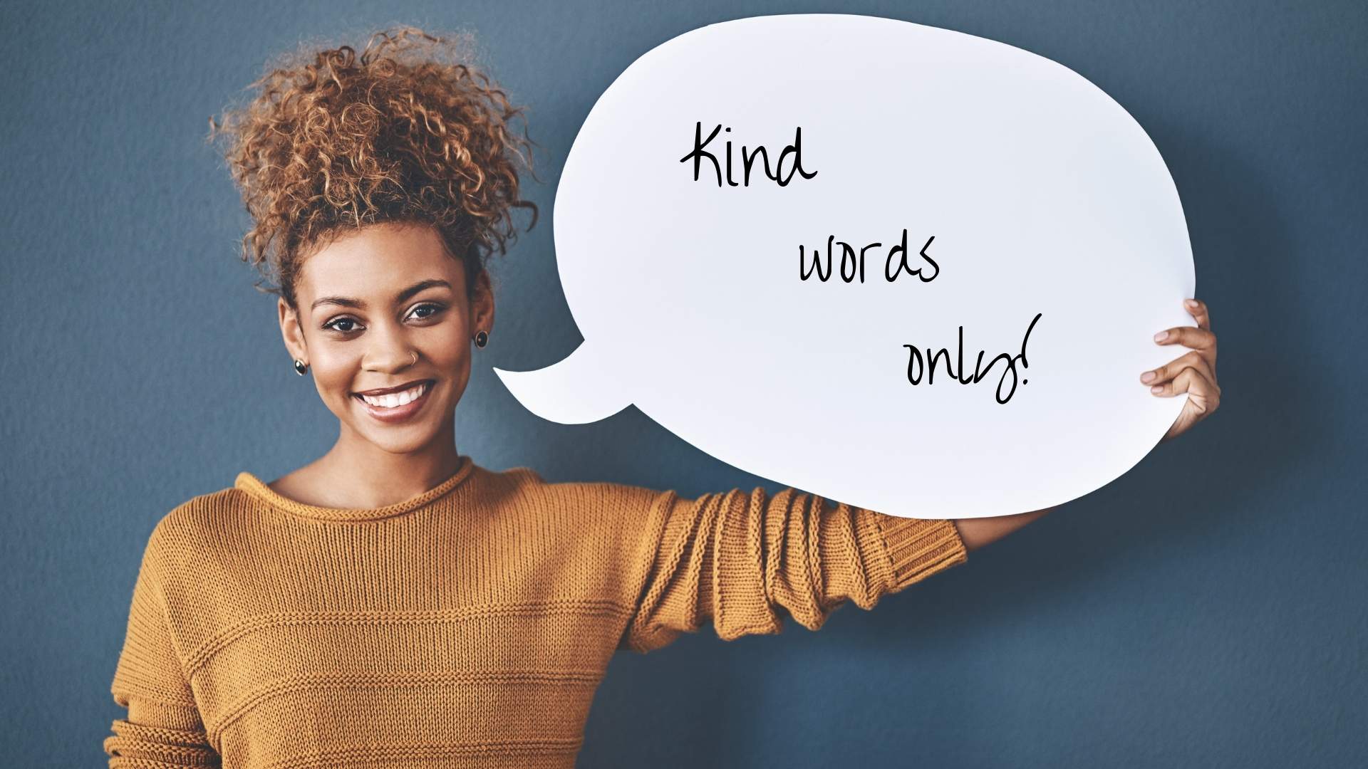 smiling girl allowing only kindness to rule her words