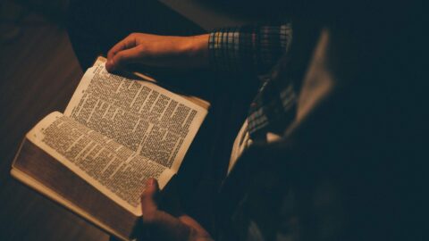 Man reading the bible depicts a healthy mind