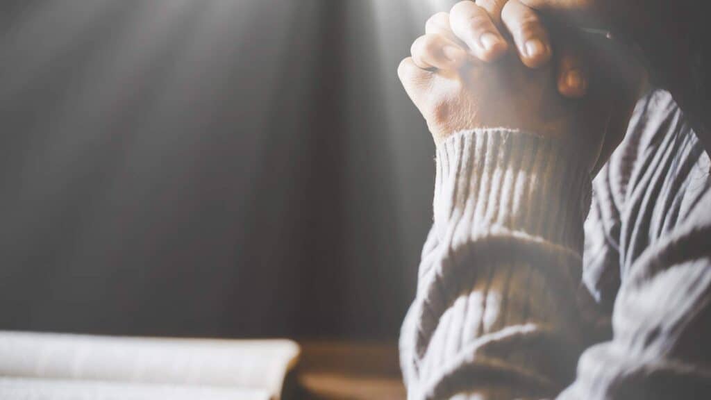 hands folded in prayer