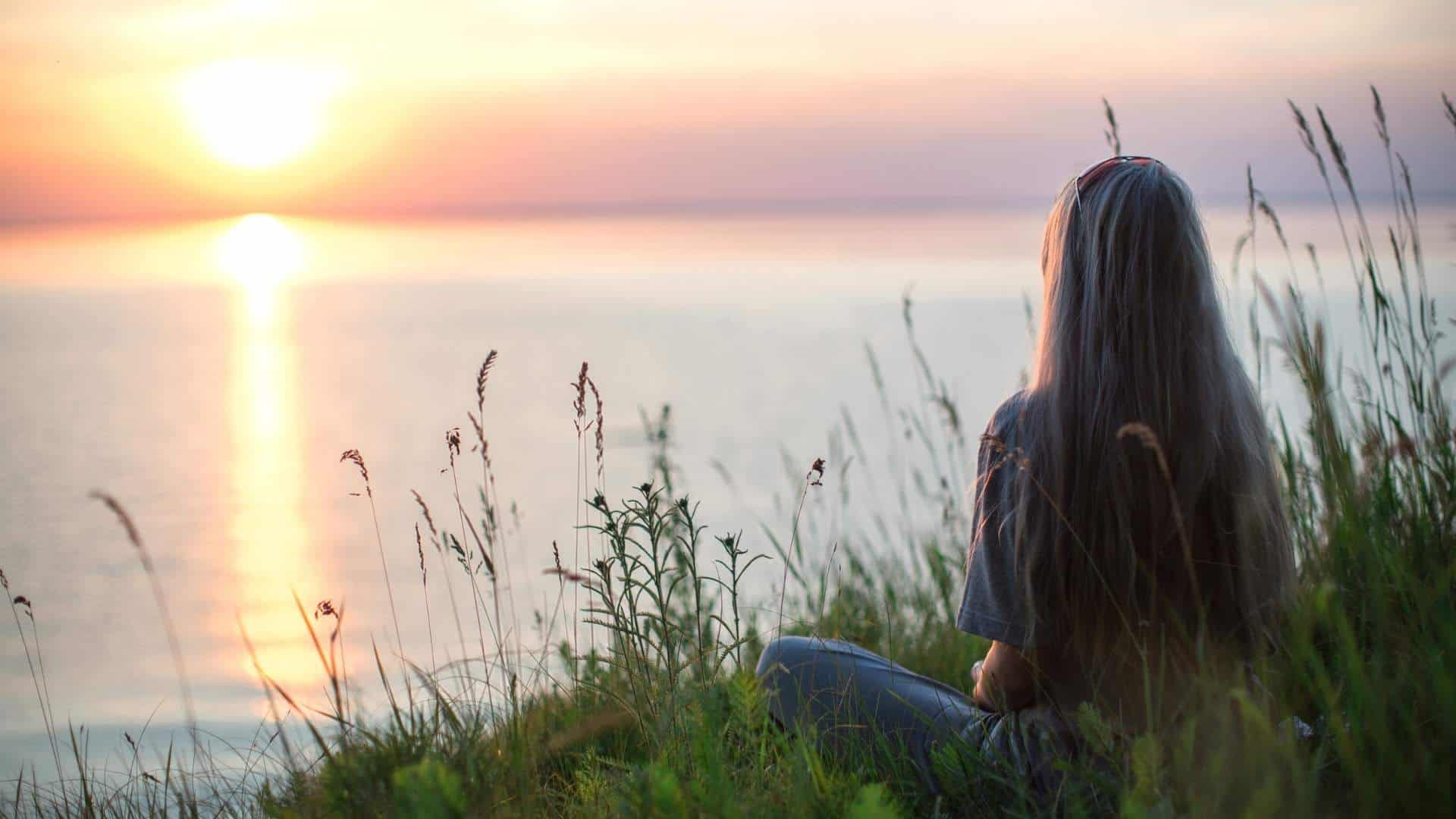 girl watching sunrise