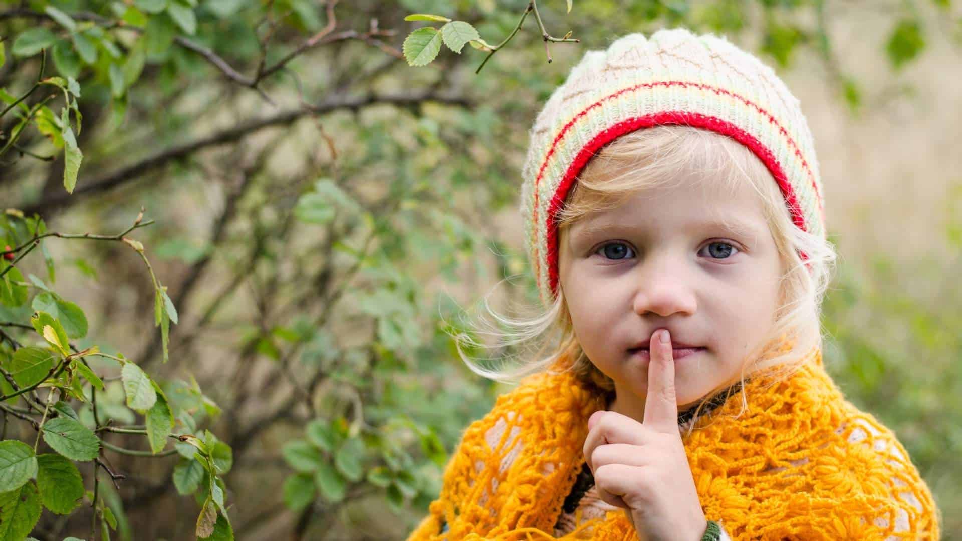 Spiritual silence as represented by this photo of little girl with finger to lips