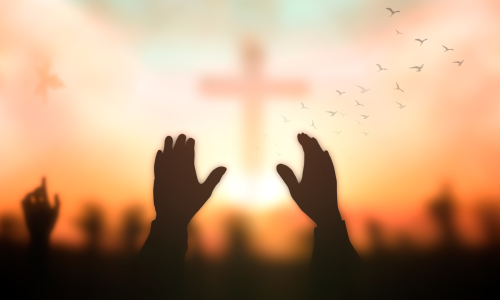 Hands stretching towards a cross represent God's solution to man's anxiety.