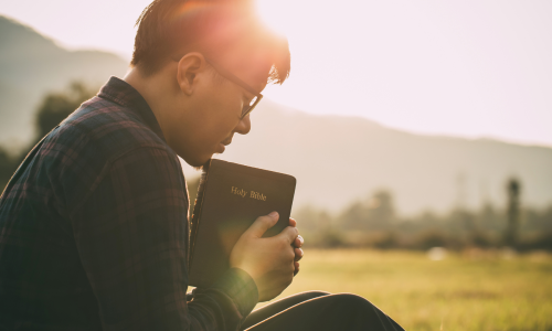 Man holding a bible