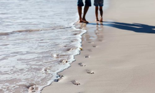 child beach footsteps