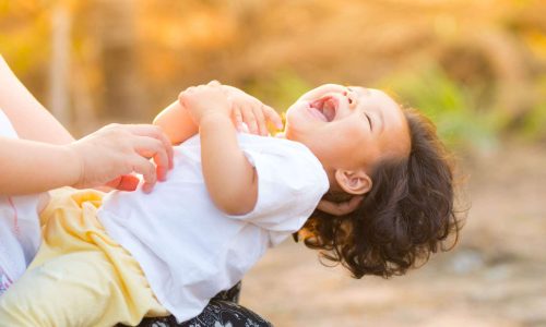 child laughing full of joy