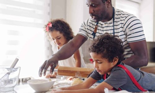 father working with kids