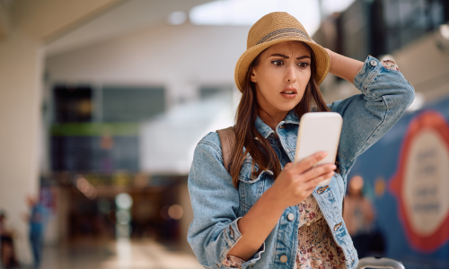 girl at airport trying to call