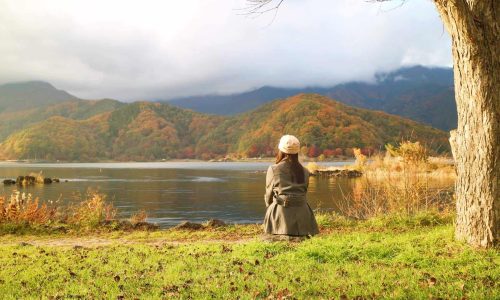 girl lake mountains