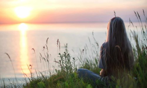 girl watching sunrise