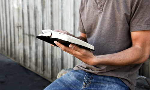 man reading bible