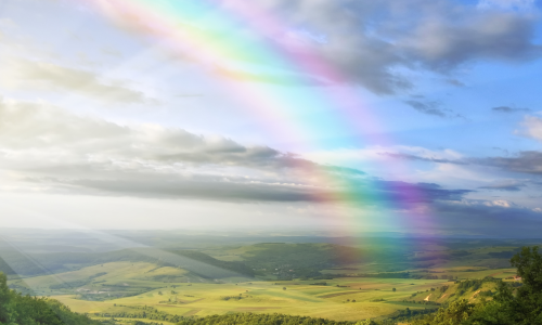 Rainbow over valley represents God's kept promises and why we can trust God. He fulfills his promises