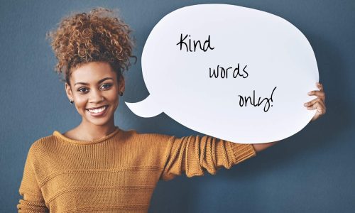 smiling girl allowing only kindness to rule her words