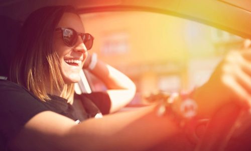 woman driving and enjoying the ride