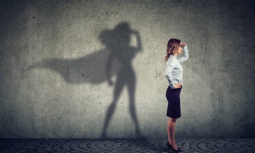 woman with superhero shadow